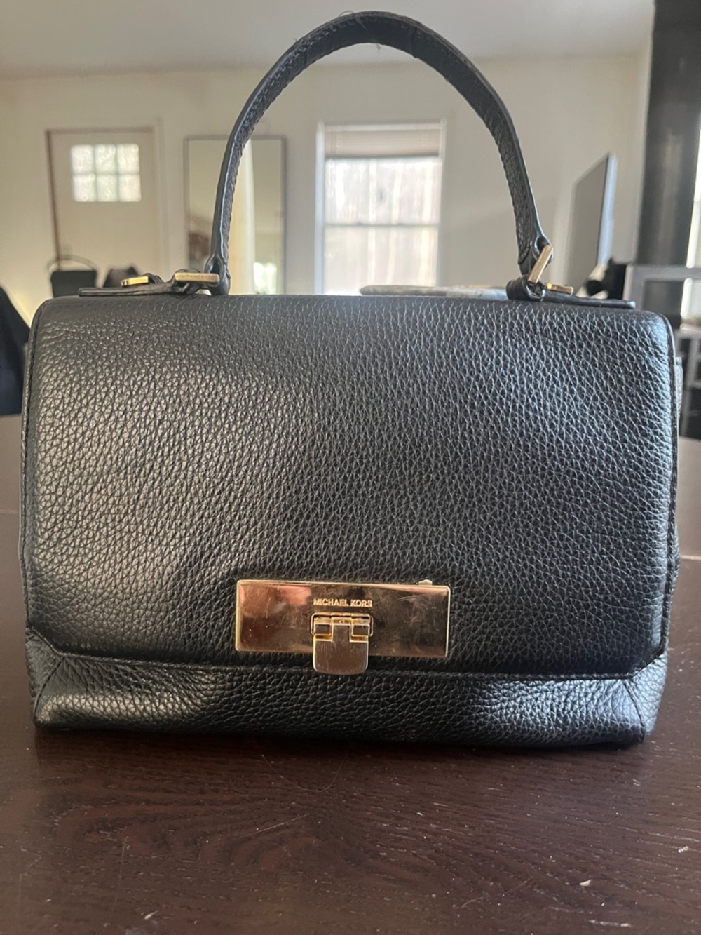 Michael Kors Callie black leather top handle fold-over flap gold lock closure